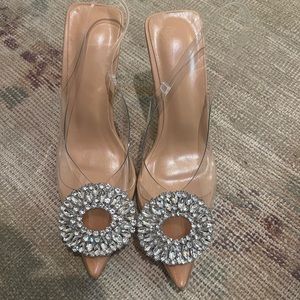 Clear slingback heels with rhinestone decor